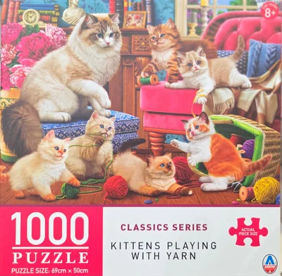 Kittens Playing with Yarn