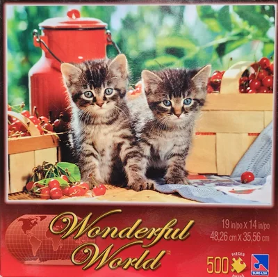 Kittens between Cherries