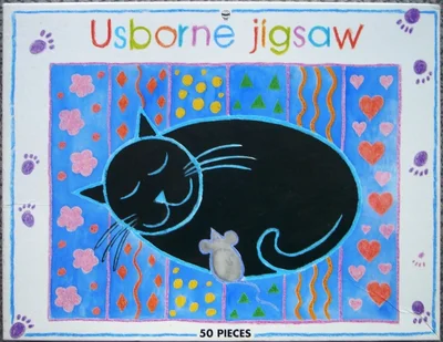 [Cat on Rug]