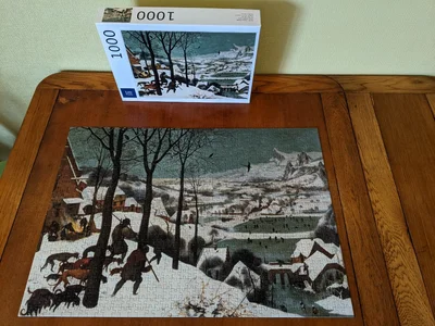 Hunters in the Snow